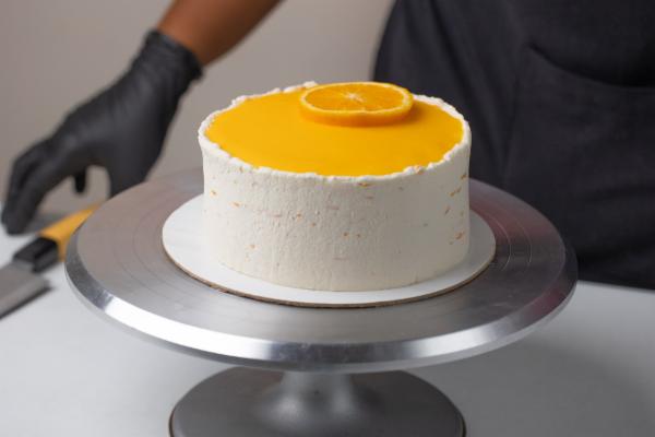 Eggless Orange Pista Cake cover