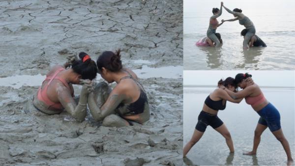 A beach tussle (includes mud wrestling and chicken fight) cover