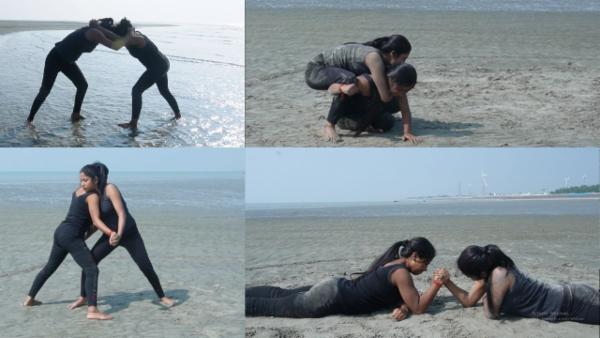 A fierce battle on the beach (lightweight bout)[intense battle] cover