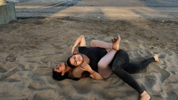 An intense beach brawl cover