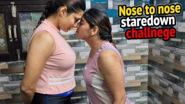 A nose to nose staredown battle cover
