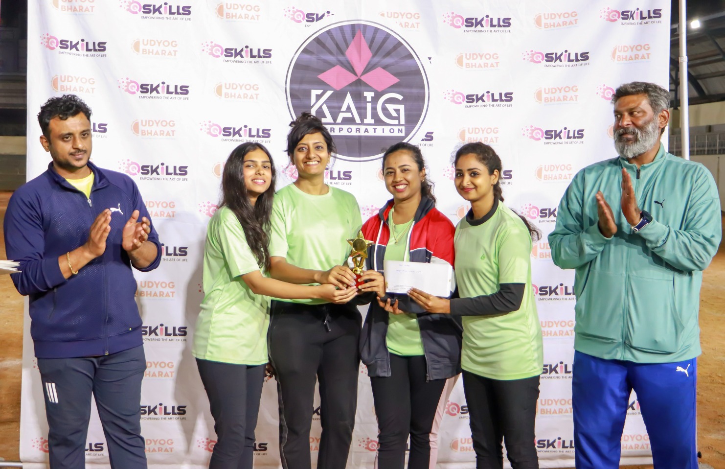 Group of athletes receiving awards and recognition at the Sports Meet