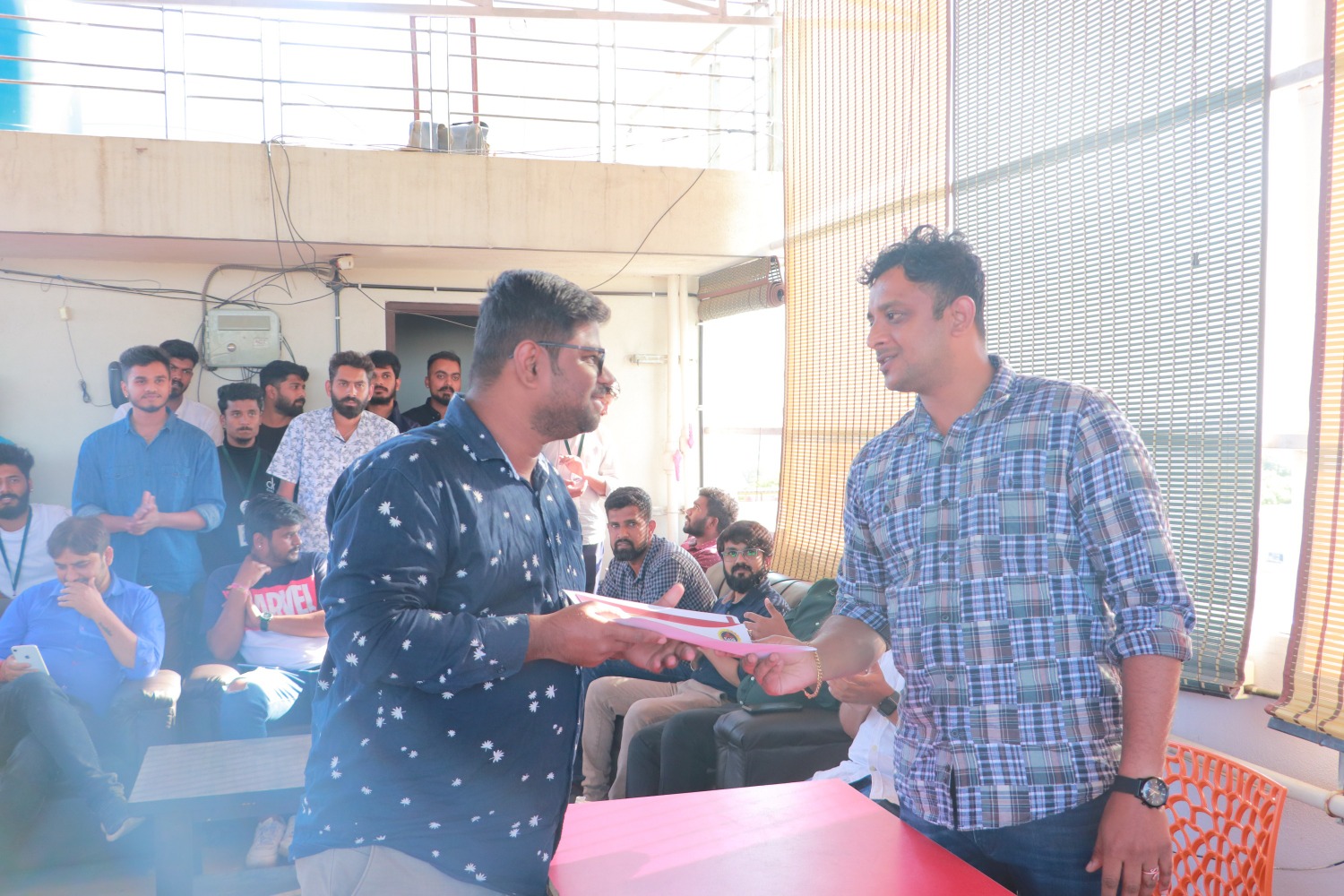 Employees receiving awards and recognition at the Rewards and Recognition Program