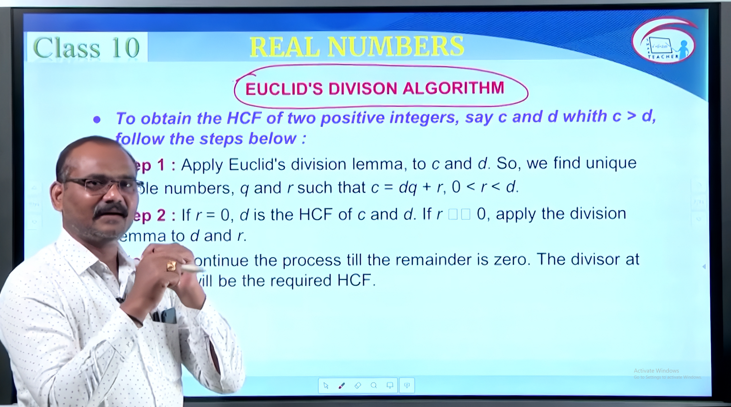 Teacher explaining on digital board