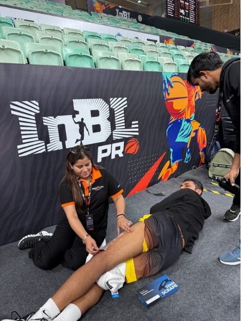 Lead Physio InBL Pro 2025 with professional basketball athletes