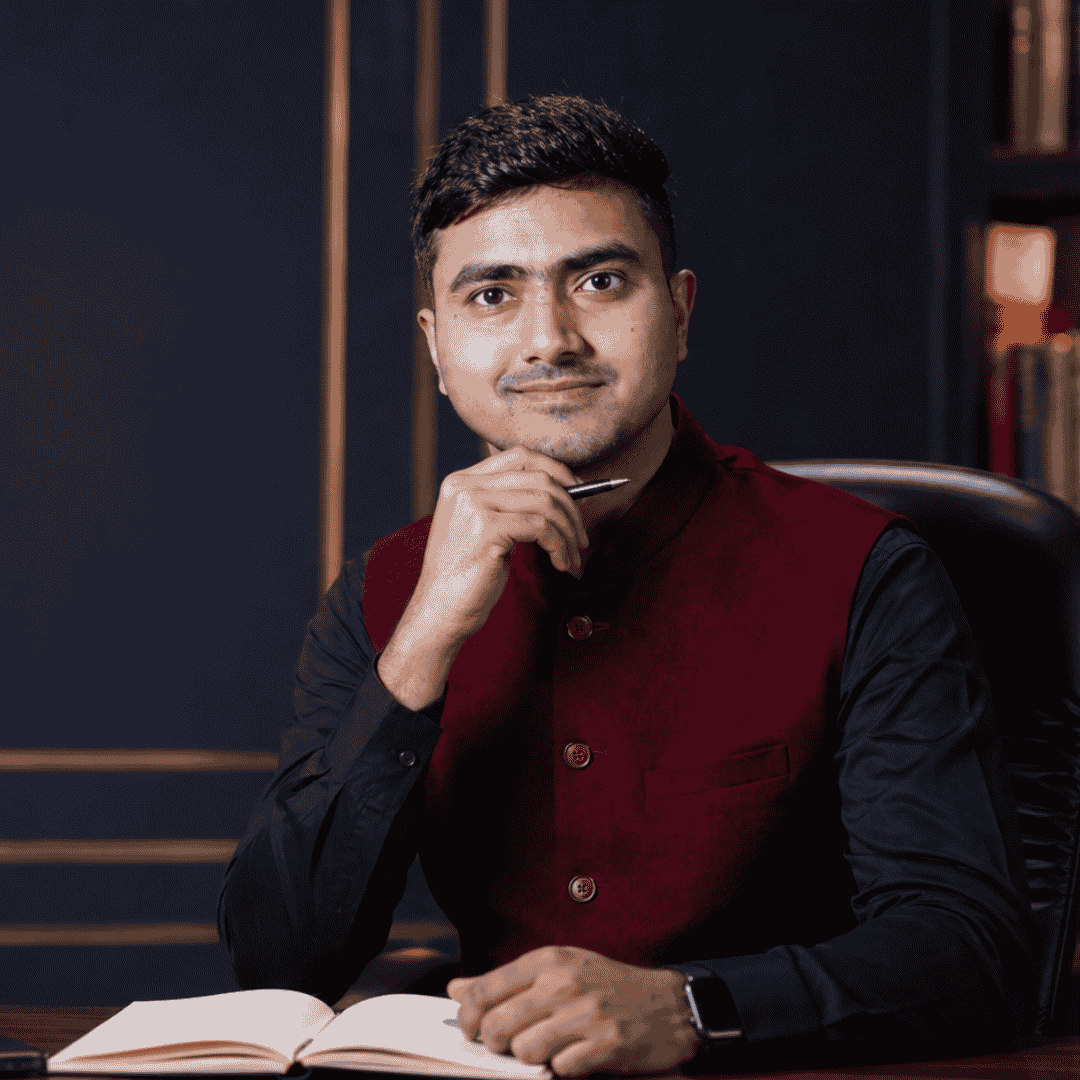 Rohan Sharma working on laptop while building Career Success Launchpad