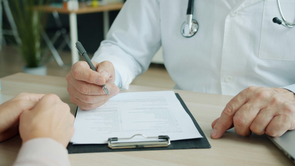 Doctor reviewing hospital management plan