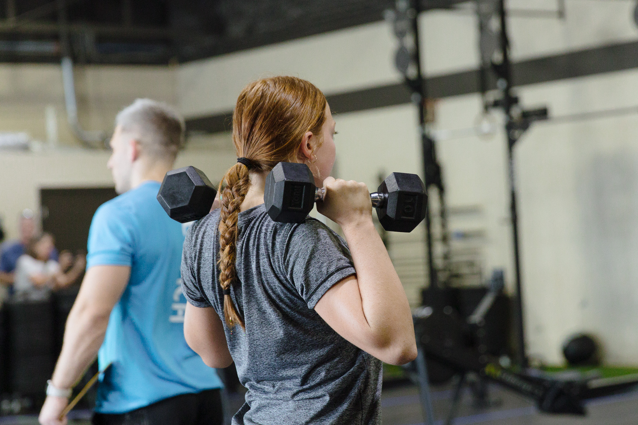 Teens stretching and discussing goals