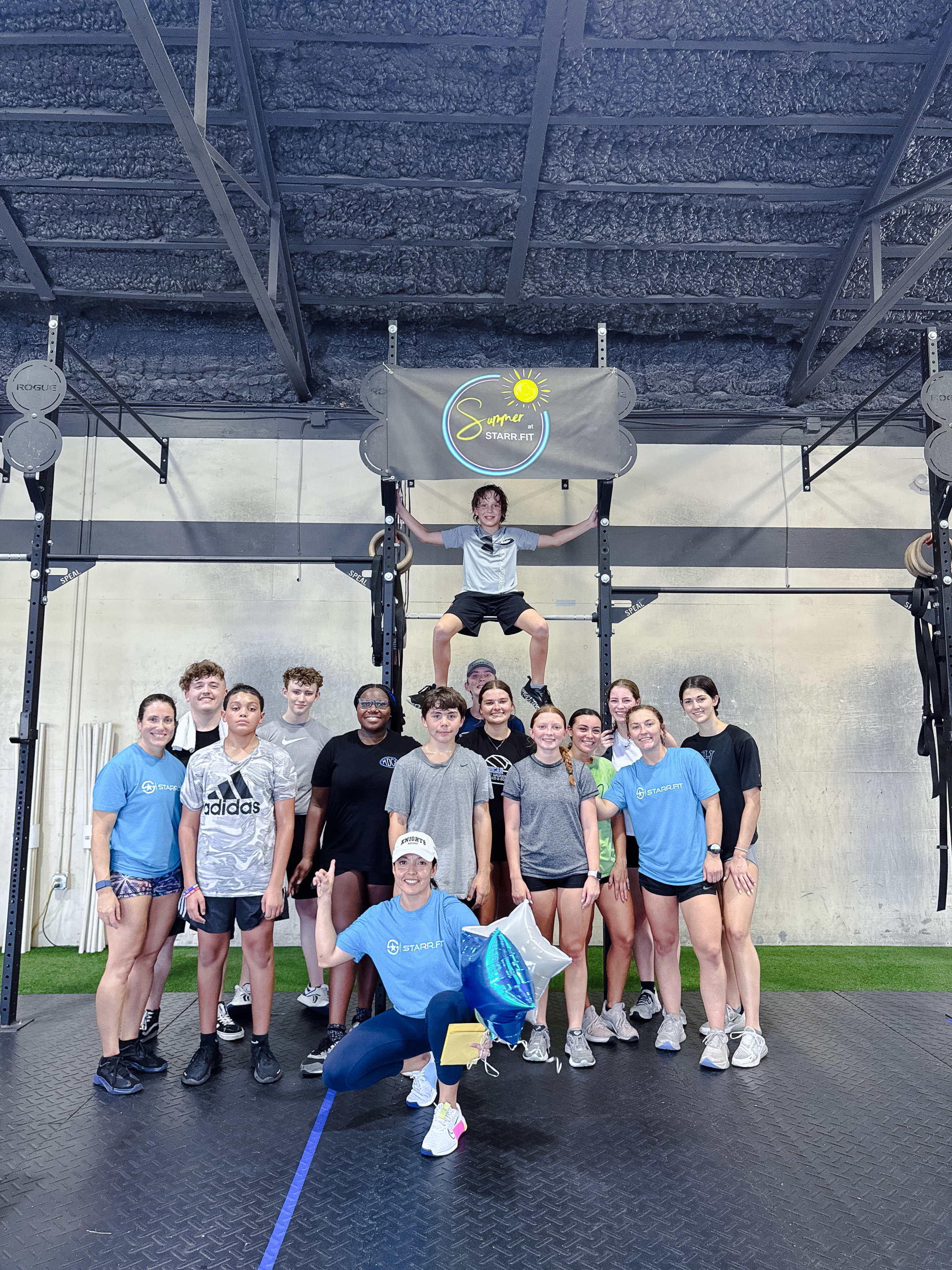 Teens training on bikes in a gym